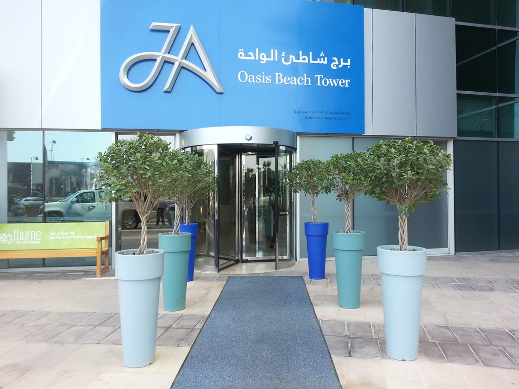interior-designer-32 Polyethylene plant pots customized Oasis Beach Hotel Dubai UAE