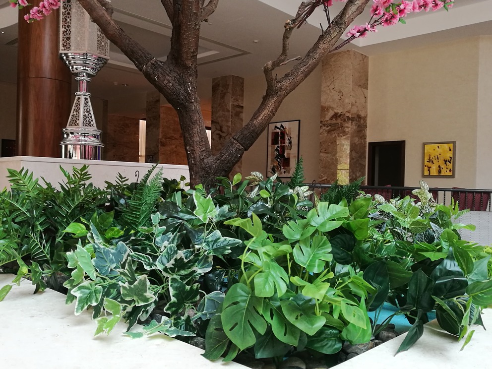 customized mixed green artificial plants sheraton hotel oman