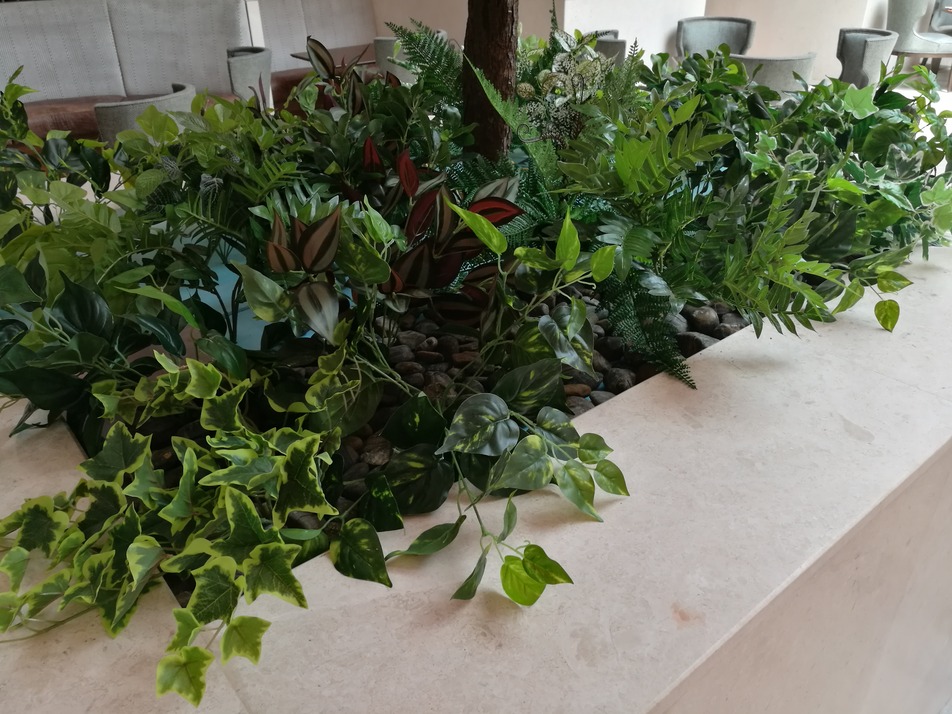 customized mixed green artificial plants sheraton hotel oman